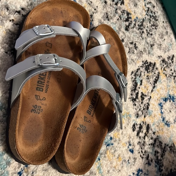 Birkenstock Shoes - Super cute Birkenstocks, silver in color goes with everything!